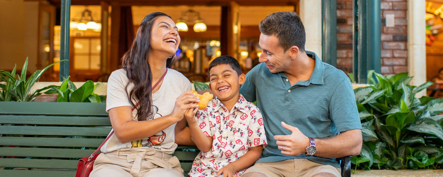 Family enjoying a Mickey waffle at Scat Cats Club at Disneys Port Orleans Resort - French Quarter