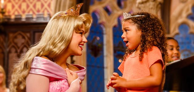 Girl with Sleeping Beauty at Cinderella's Royal Table