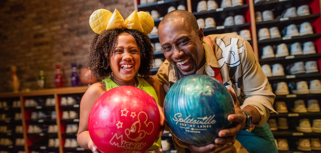 Father and daughter enjoy bowling at Splitsville Luxury Lanes.
