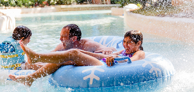 Family enjoying Cross Country Creek at Disney's Blizzard Beach