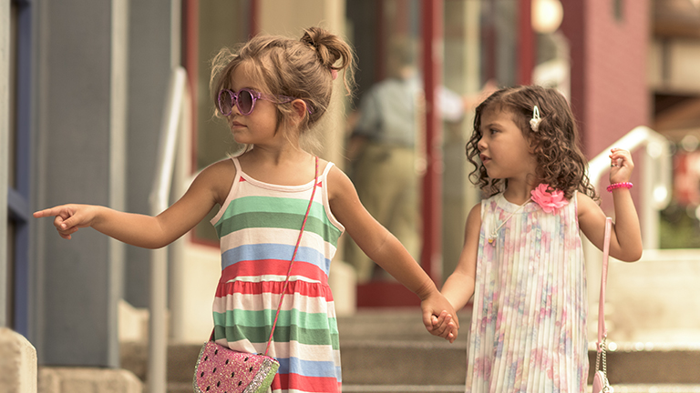 Young guests taking in the sights at Disney Springs