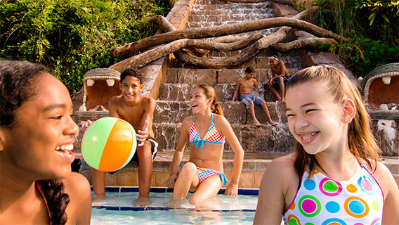 Teenagers in the pool at Coronado Springs